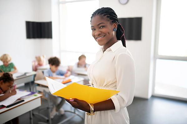 Woman holding yellow folder