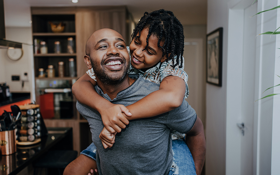 Father and carrying son on shoulders