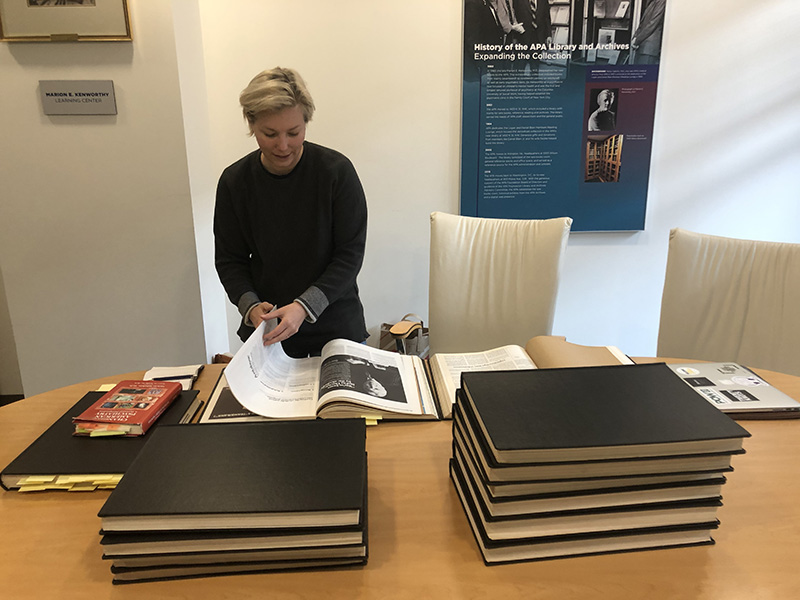 Mia Pohtola, Ph.D., explores resources from the Archives in the Marion E. Kenworthy Learning Center at APA HQ